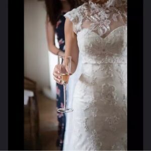 Justin Alexander Elegant Lace Wedding Dress with train and jacket